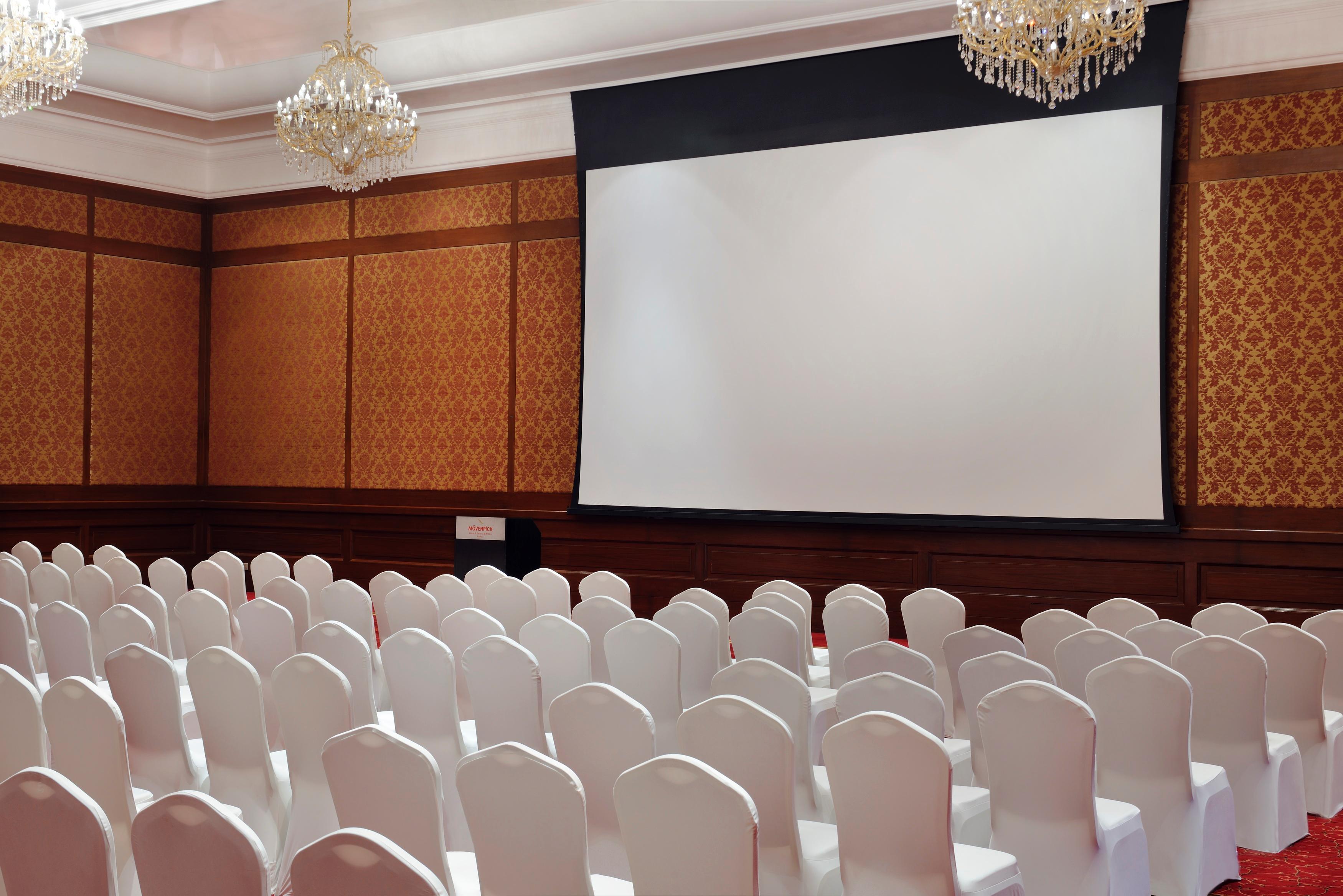 Moevenpick Hotel & Resort Al Bida'A Salmiya Bagian luar foto A projection screen in a conference room