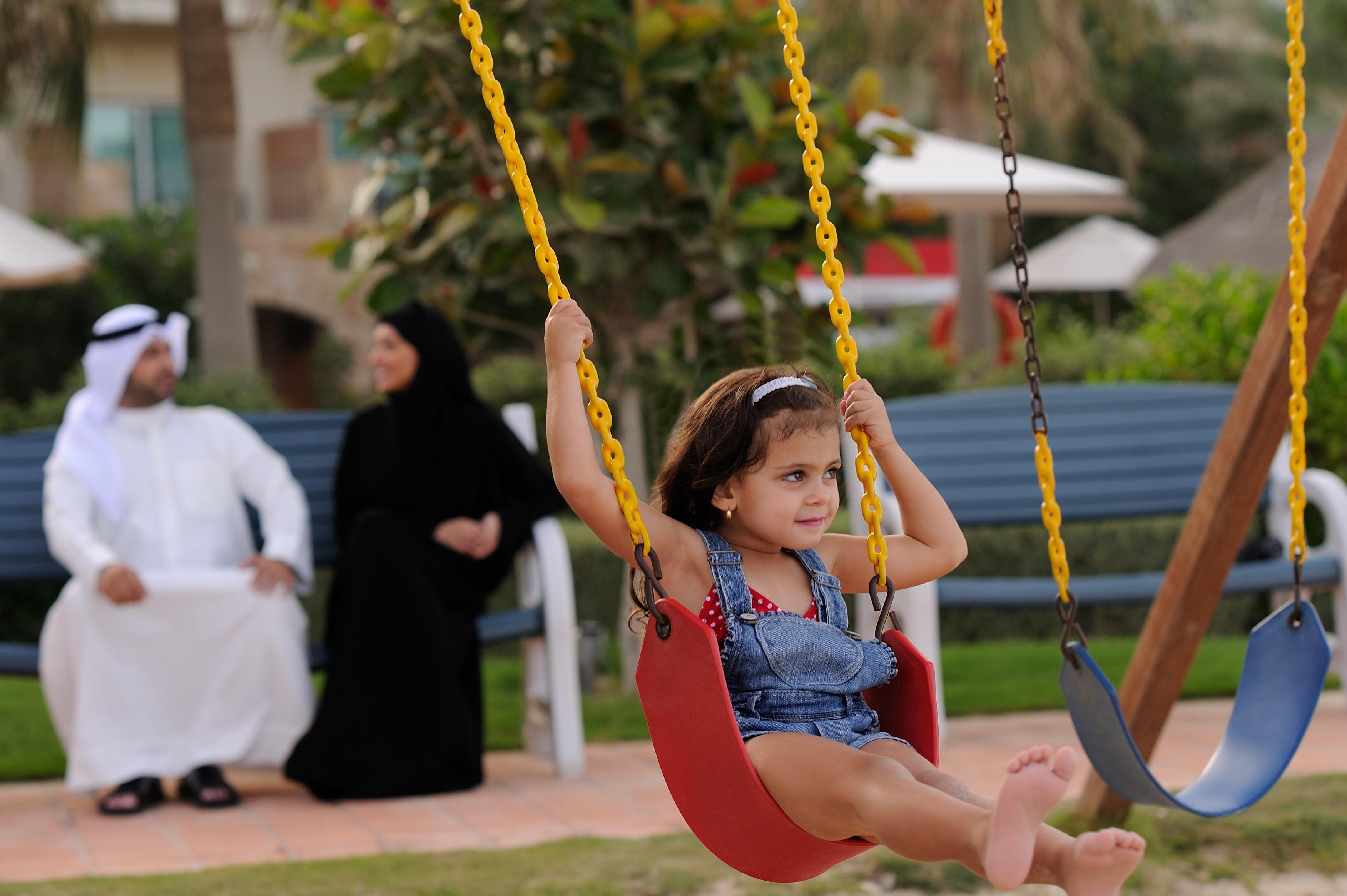 Moevenpick Hotel & Resort Al Bida'A Salmiya Bagian luar foto A child on a swing