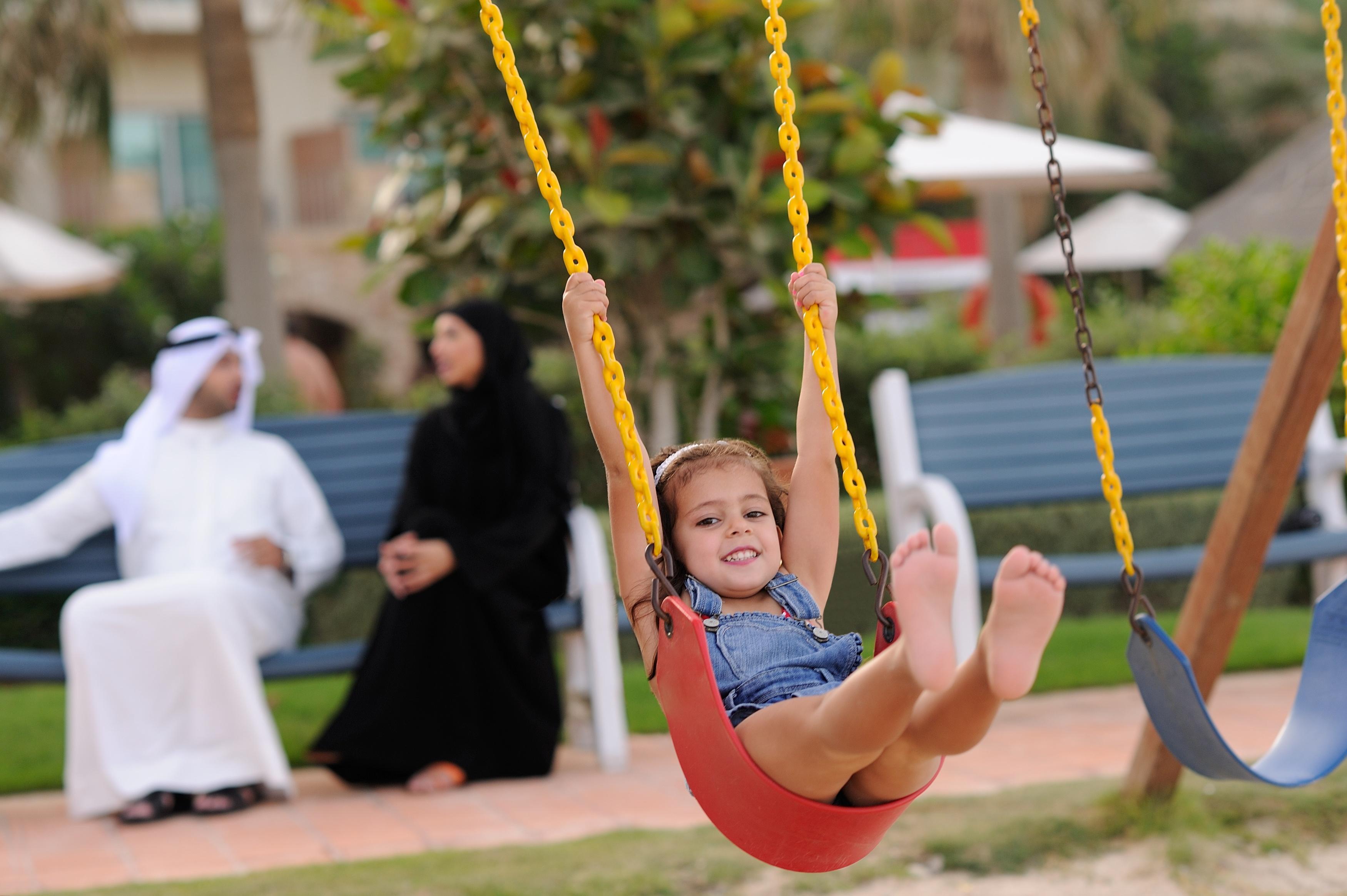 Moevenpick Hotel & Resort Al Bida'A Salmiya Bagian luar foto A child on a swing